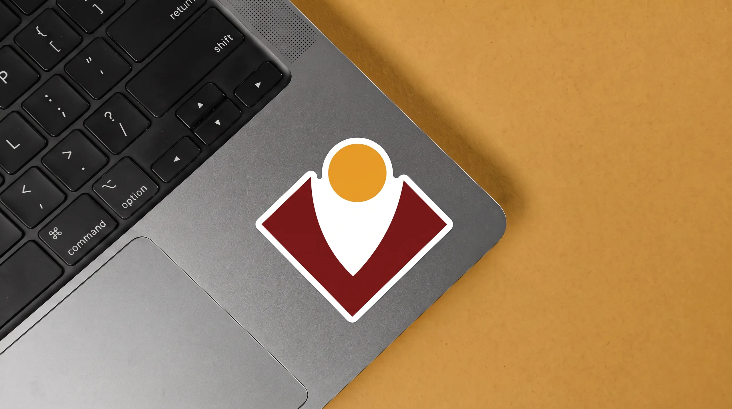 Lyumic sticker on laptop