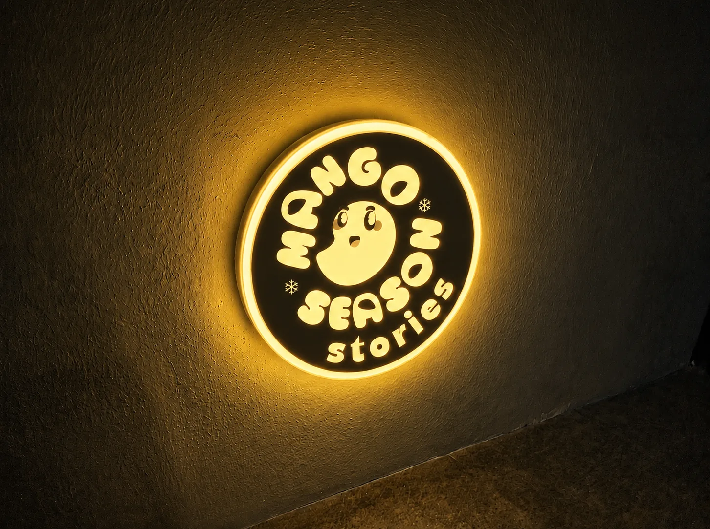 Mango Season Stories logo on clapperboard