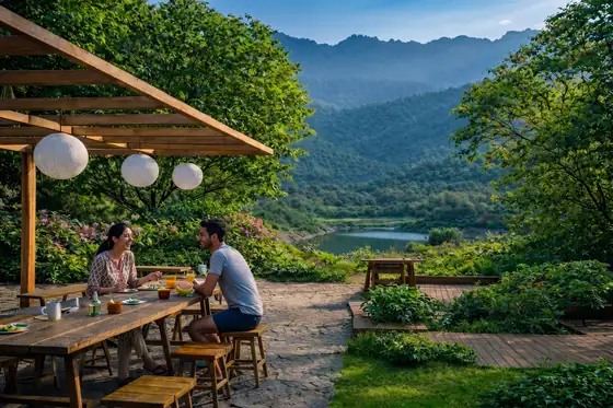 Harvest House — a long table under lanterns, valley beyond